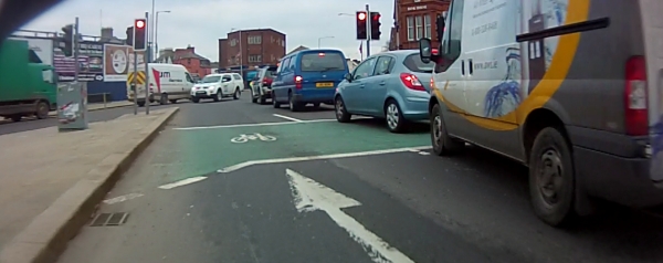 Motor vehicles blocking a cycle box at a Belfast junction