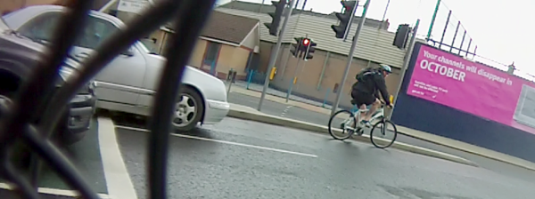 Cyclist forced to position himself ahead of cycle box by blocking vehicles