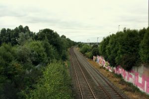 Belfast - Holywood Belfast-Bangor railway line, A2 to the right, Alderman Tommy Patton Memorial Park far left